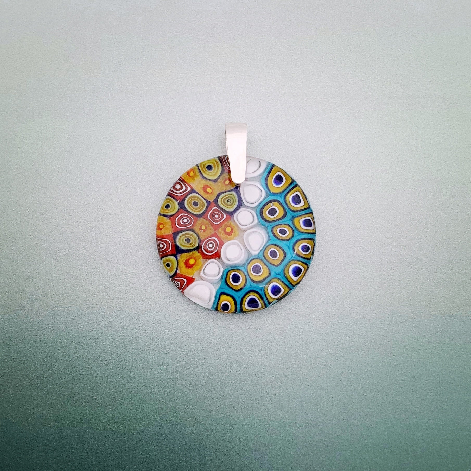 Fused millefiori and peacock 35mm round glass pendant
