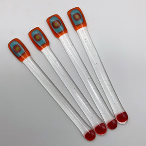 Orange glass swizzle stick