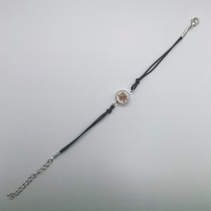 Black rope bracelet with glass owl centre piece