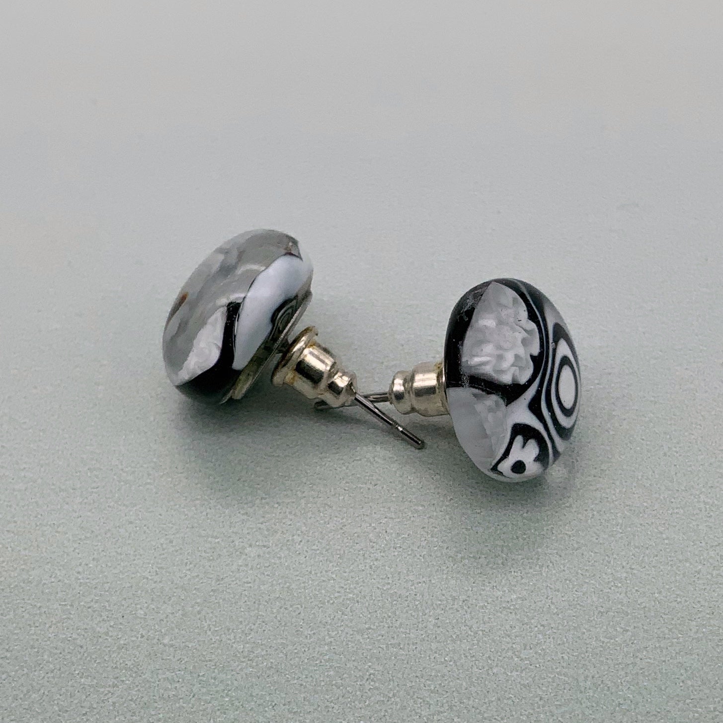 Black and white glass stud earrings