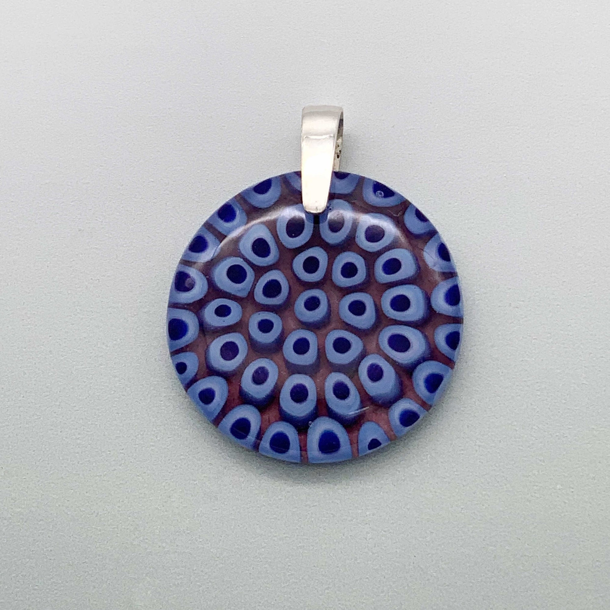 Blue Caviar 35mm round glass pendant with a plum undertone