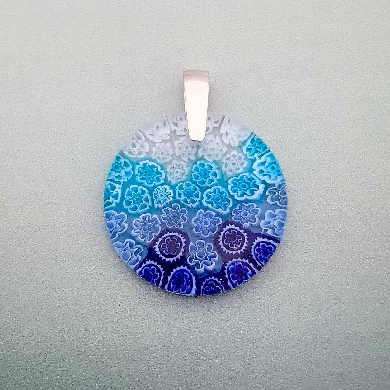 Fused Millefiori glass 35mm round pendant in sky cascade fleurette