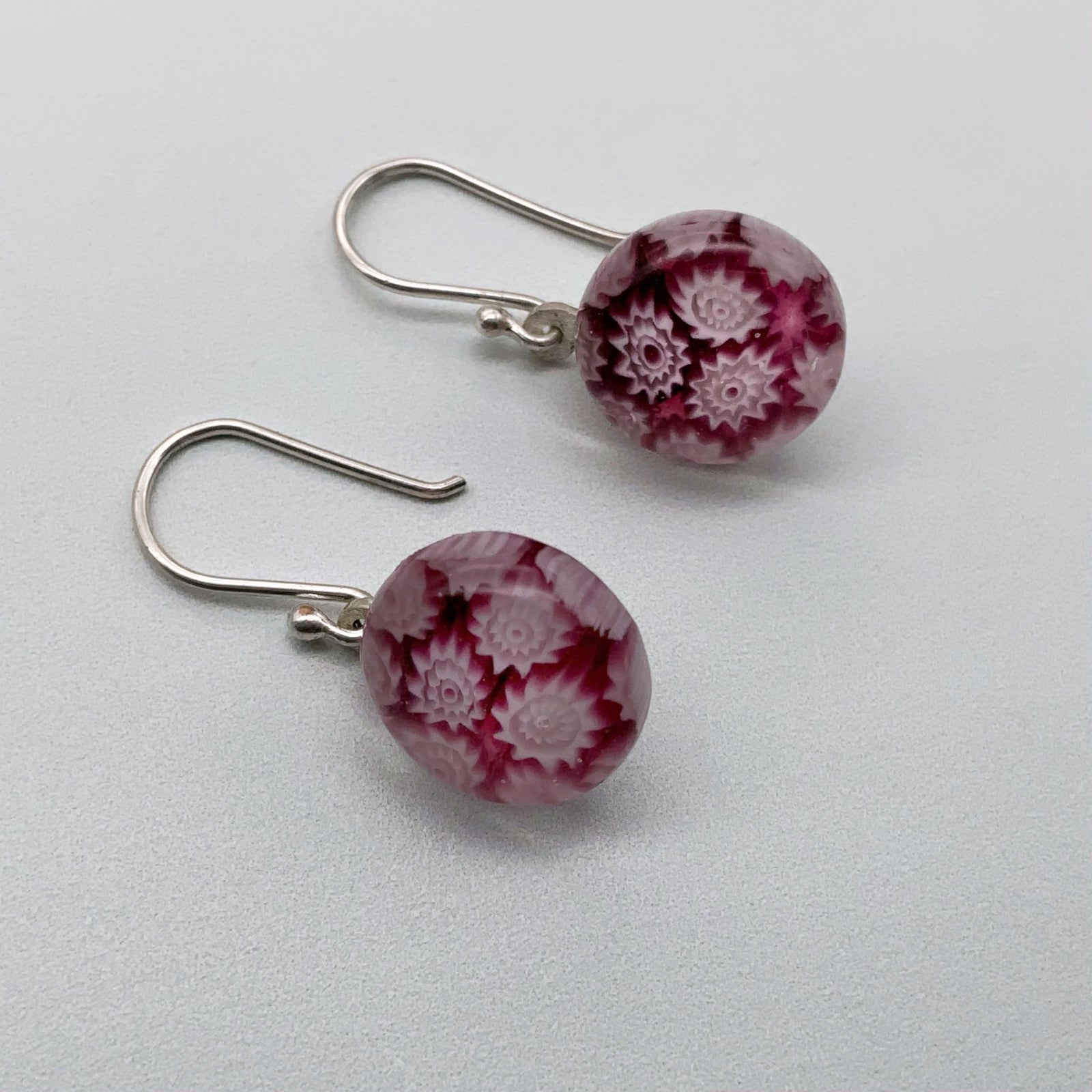 Fused plum glass fleurette dangle earrings