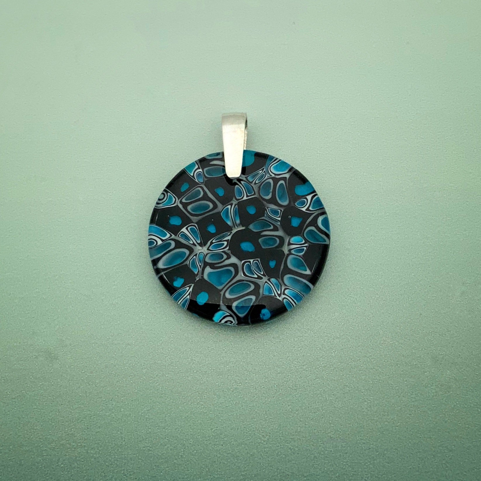 Murrini turquoise and black 35mm round glass pendant