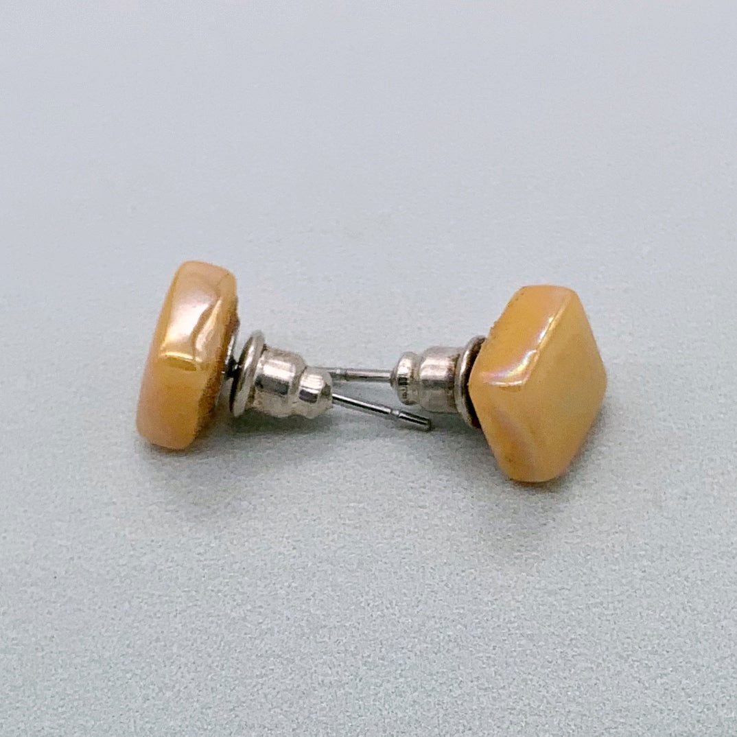 Square spot studs in mustard glass