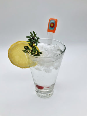 Orange glass swizzle stick
