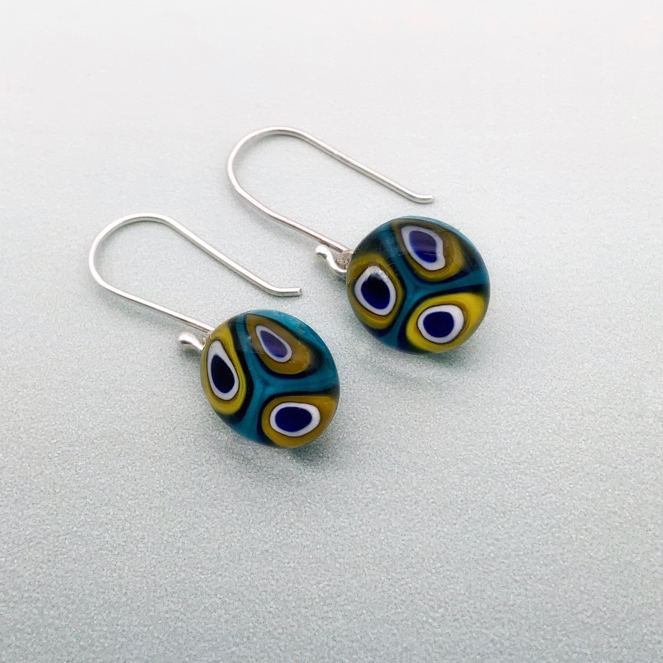 Peacock inspired glass dangle earrings