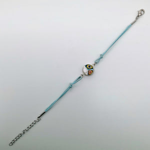 Turquoise bracelets with a mixed selection of glass centers