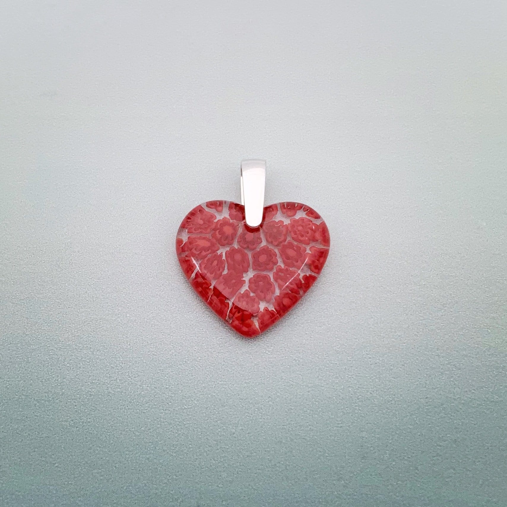 Fused millefiori small glass heart pendant in red fleurette