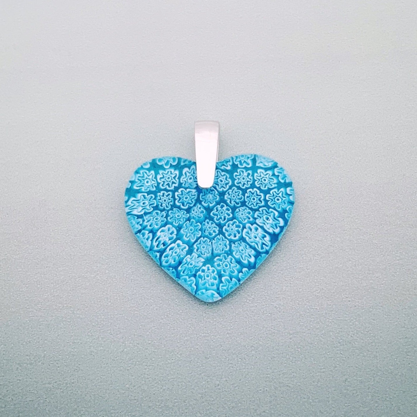 Fused millefiori glass small heart pendant in turquoise fleurette