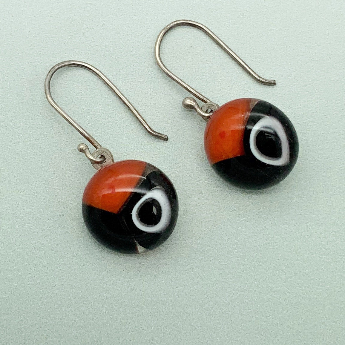 Murrini round glass dangle earrings - Black & white circles with red glass