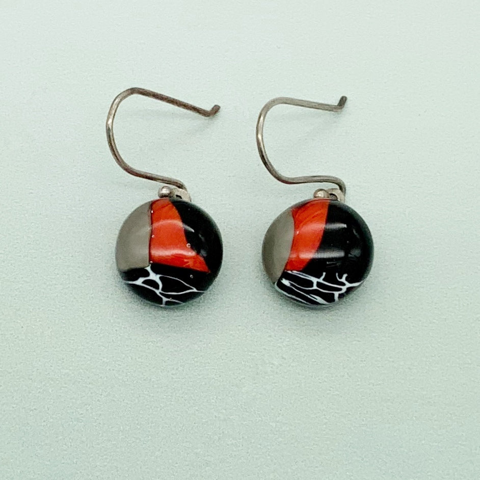 Contemporary round glass dangle earrings in black, red and white