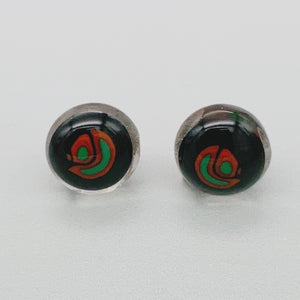 Black stud earrings with green and red glass