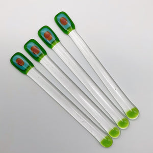 Green glass swizzle sticks