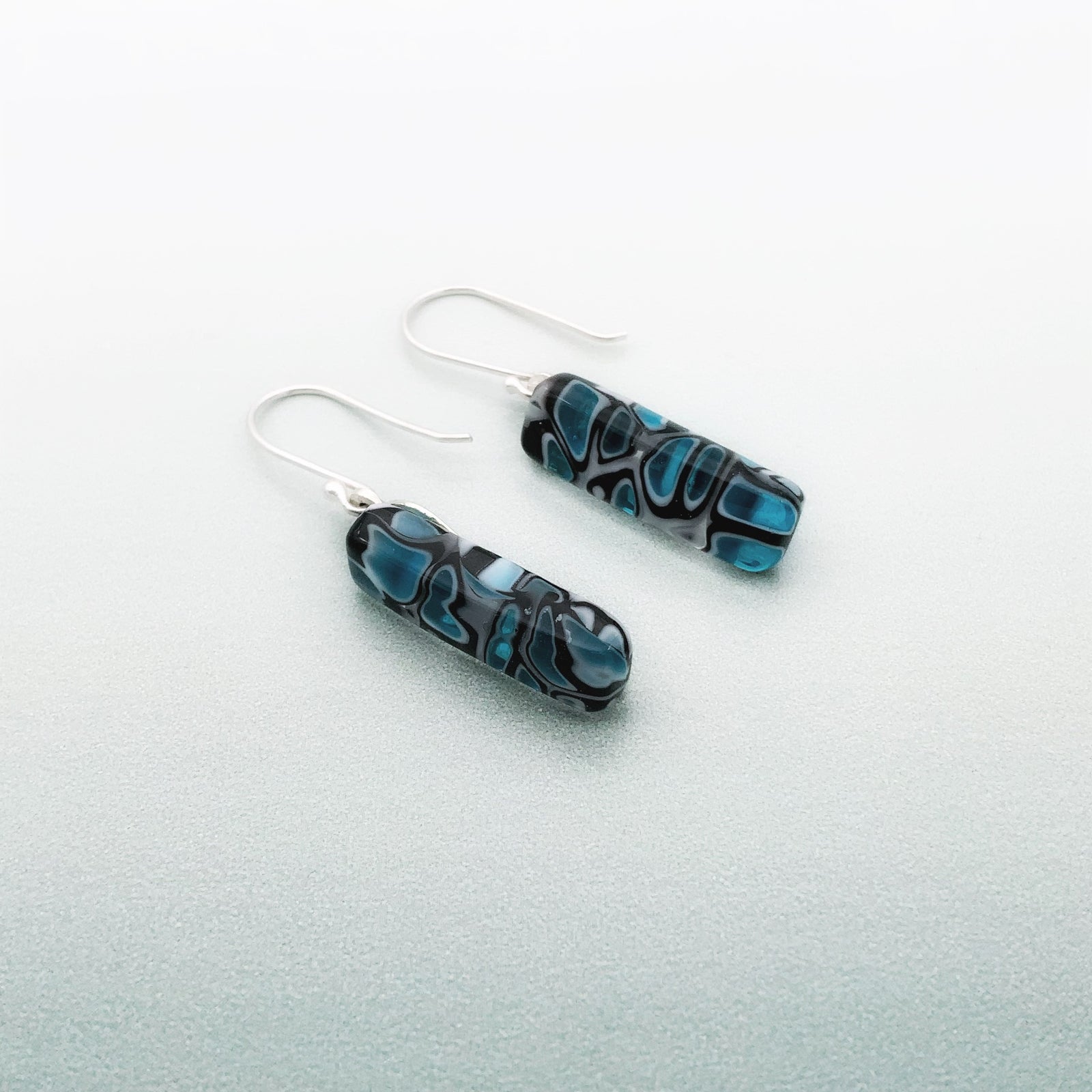 Murrini white, turquoise and black long glass dangle earrings