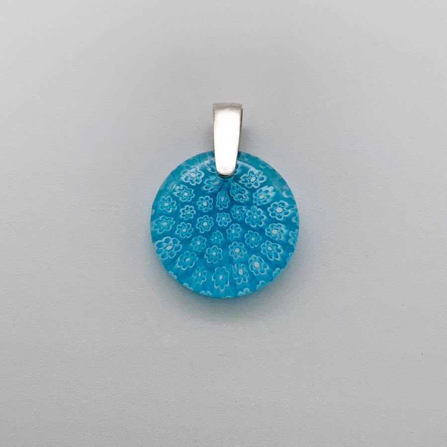 Small round turquoise fleurette glass pendant