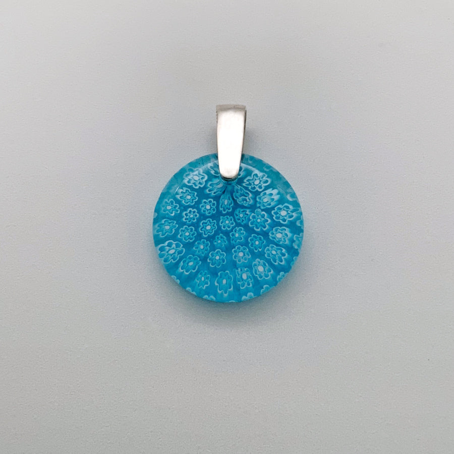 Small round turquoise fleurette glass pendant