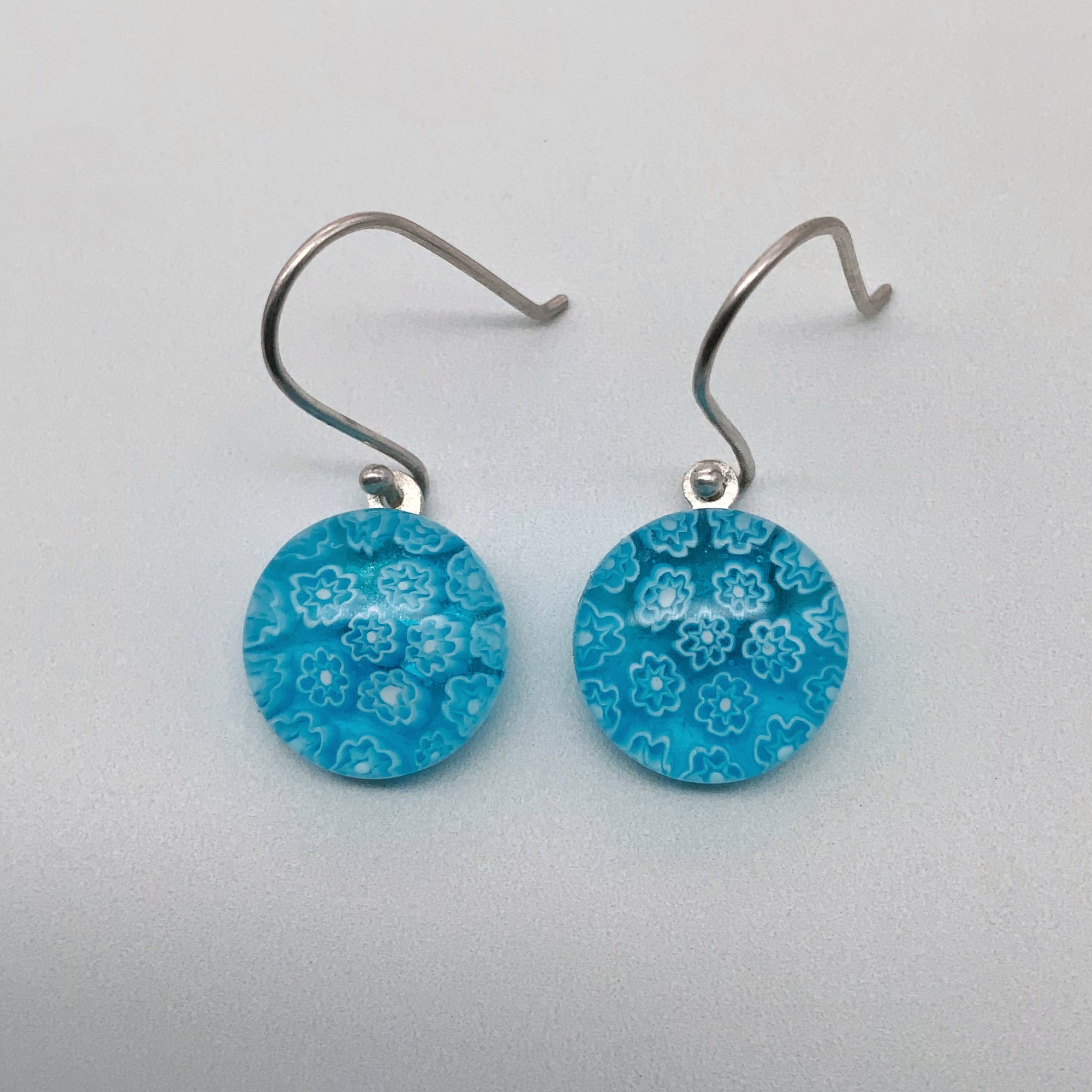 Fused turquoise fleurette dangle earrings